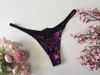 Imagen de Victoria's Secret  Panty Negro Flores Moradas Brillos
